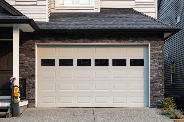 White garage door with windows in a residential home.