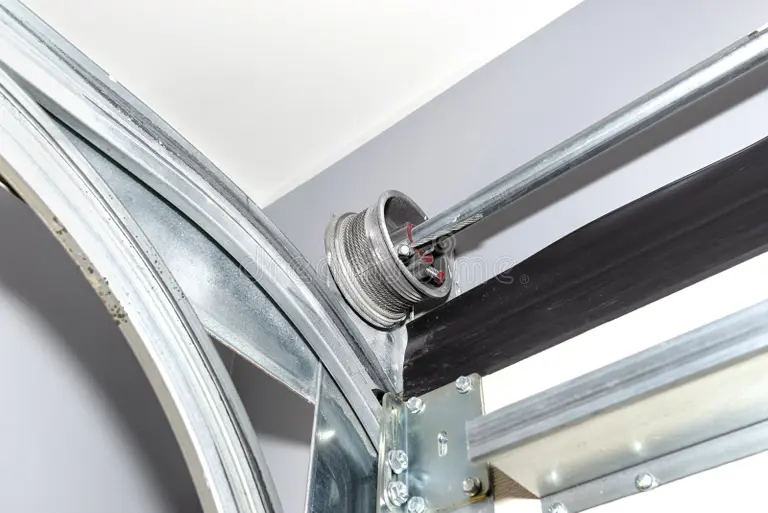 Garage door spring and pulley system.