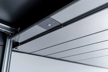 Close-up of a metal garage door panel with sleek design.